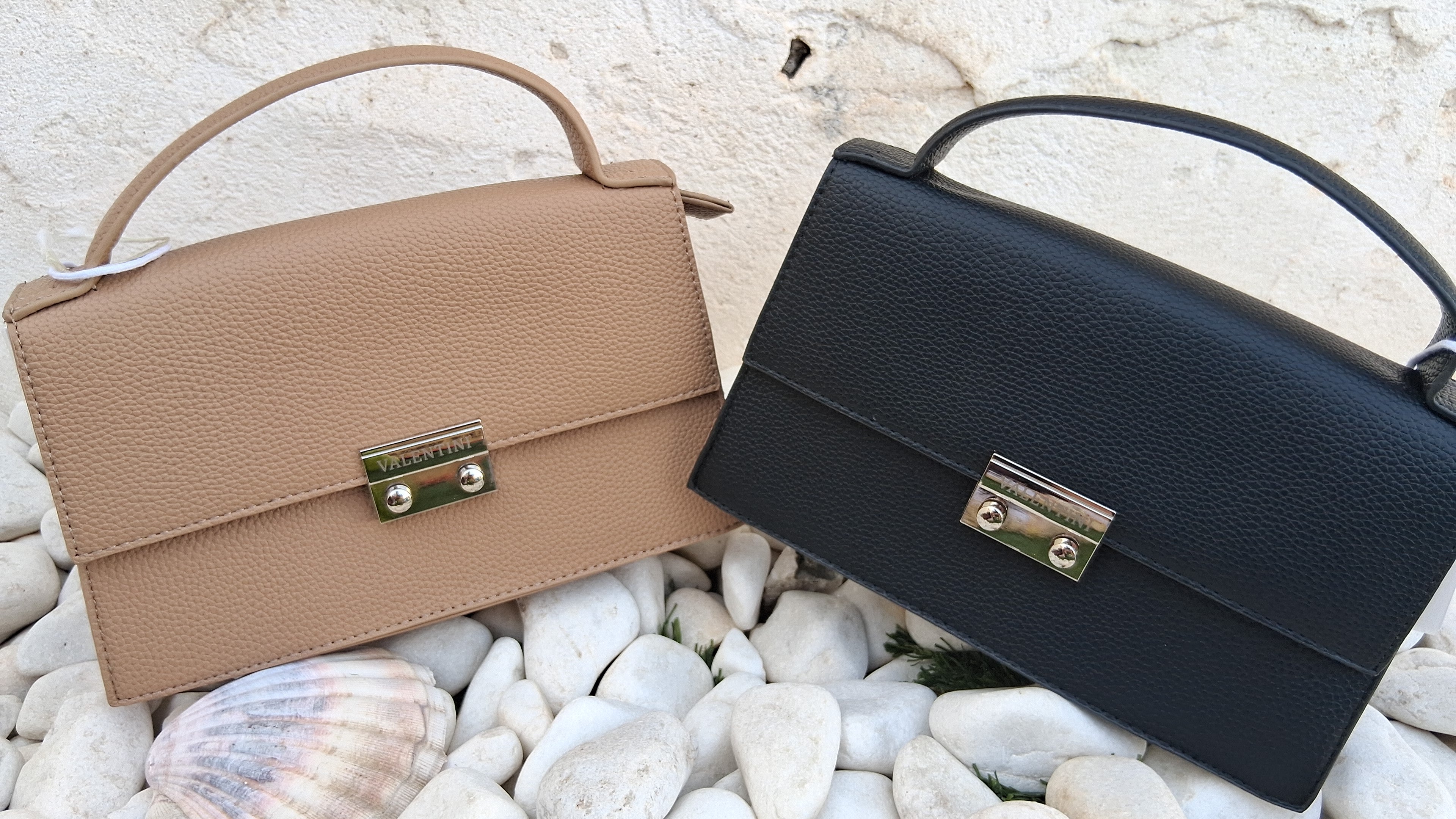 Bolso de mano estructurado con cierre metálico